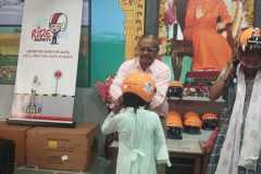 Safety Week - Helmet distribution to parents and child